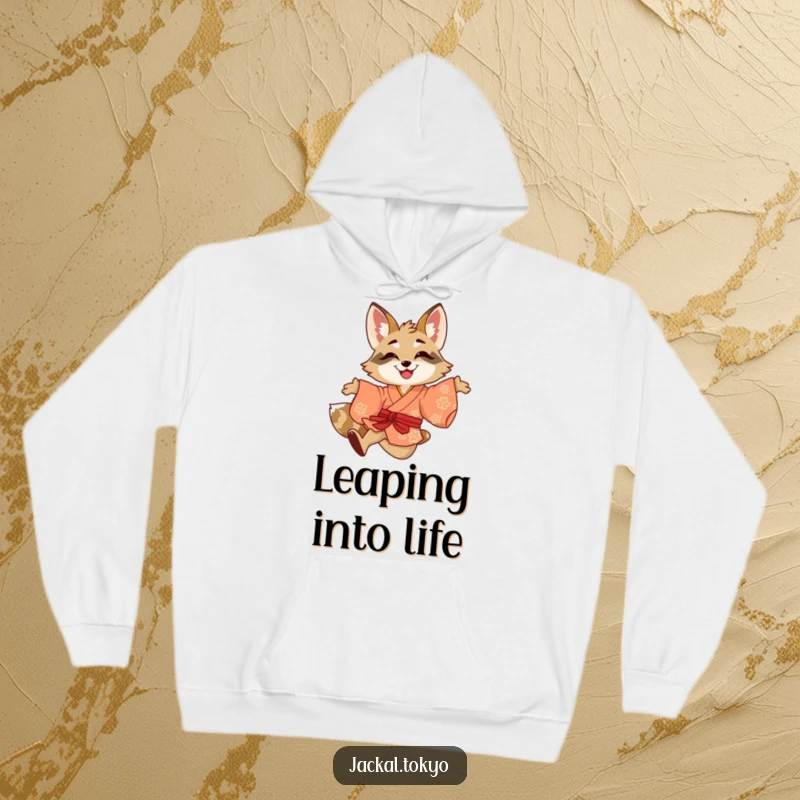 Funny hoodie featuring a smiling jackal playfully leaping in a brightly colored kimono, embodying vibrant energy and fun.